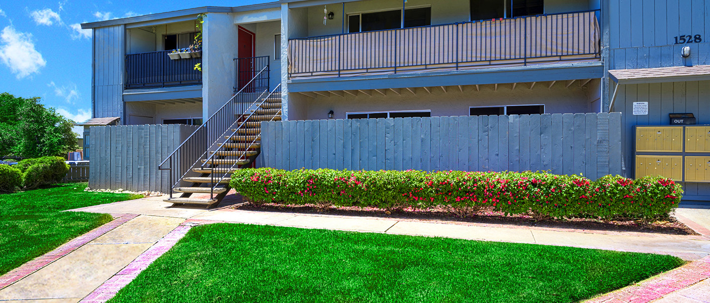 This image shows the entrance of one of Summer Hill Apartments